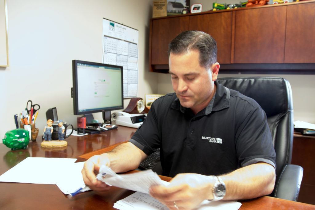 John at his desk